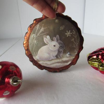 Lot 629:  Three Figural Glass Christmas Ornaments