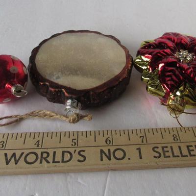 Lot 629:  Three Figural Glass Christmas Ornaments