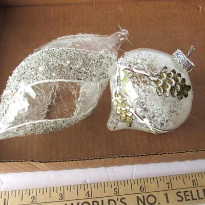 Lot 630:  Two Large Clear and White Christmas Ornaments