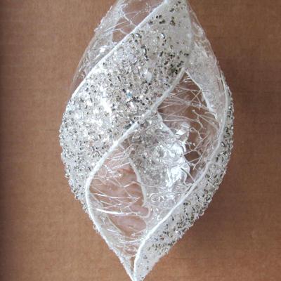 Lot 630:  Two Large Clear and White Christmas Ornaments