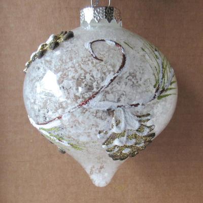 Lot 630:  Two Large Clear and White Christmas Ornaments
