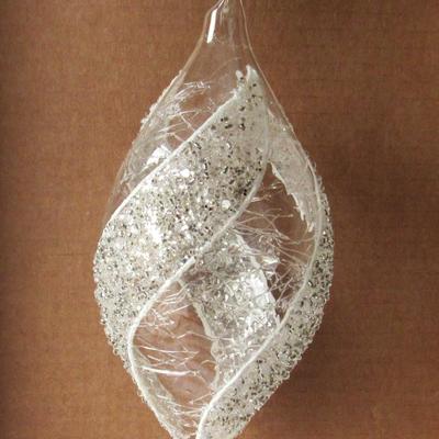 Lot 630:  Two Large Clear and White Christmas Ornaments