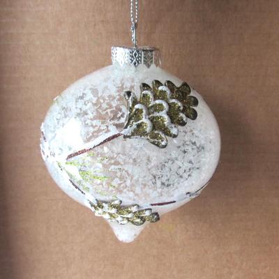 Lot 630:  Two Large Clear and White Christmas Ornaments