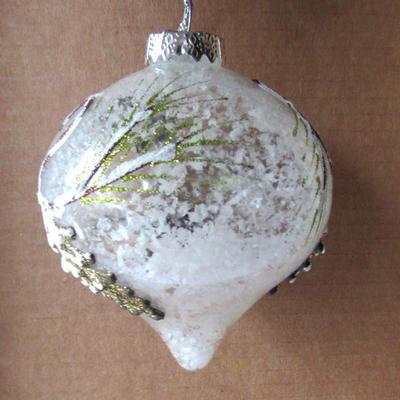 Lot 630:  Two Large Clear and White Christmas Ornaments
