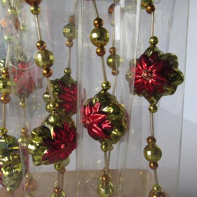 Lot 631:  Lot of Poinsettia and Bead Glass Garland, New in Box