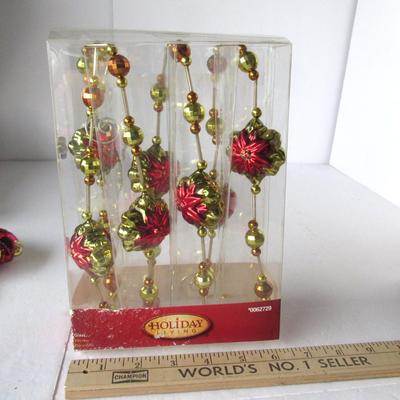Lot 631:  Lot of Poinsettia and Bead Glass Garland, New in Box