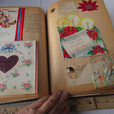 Lot 634:  Vintage Scrap Book With Lots of Paper Ephemera