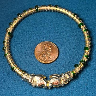 SERPENT BANGLE BRACELET GOLD TONE WITH GREEN STONE EMBELLISHMENT