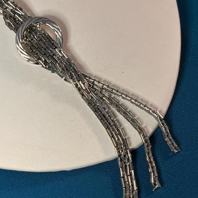 INTERESTING MULTI-CHAIN THROUGH RING DANGLY NECKLACE