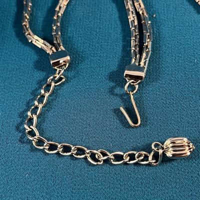 INTERESTING MULTI-CHAIN THROUGH RING DANGLY NECKLACE