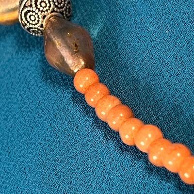 LOVELY ORANGE-BROWN POLISHED STONE MEDALLION, BEADED NECKLACE