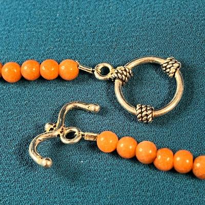 LOVELY ORANGE-BROWN POLISHED STONE MEDALLION, BEADED NECKLACE