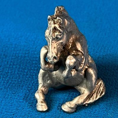 SMALL PEWTER SITTING HORSE FIGURINE