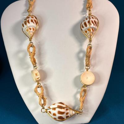 AMAZING SEASHELL NECKLACE WITH BONE-LIKE BEADS, GOLD TONE WIRE, TWINE