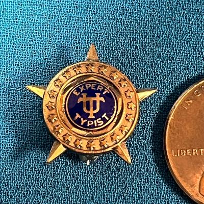 VINTAGE ENAMELED â€œEXPERT TYPISTâ€ LAPEL PIN