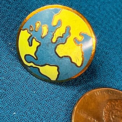 â€œBEYOND WAR 1985â€ ENAMELED WORLD MAP PIN