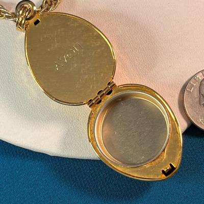 GRACEFUL TEXTURED PERFUME CREME LOCKET PENDANT BY AVON