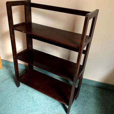 Folding wooden shelf