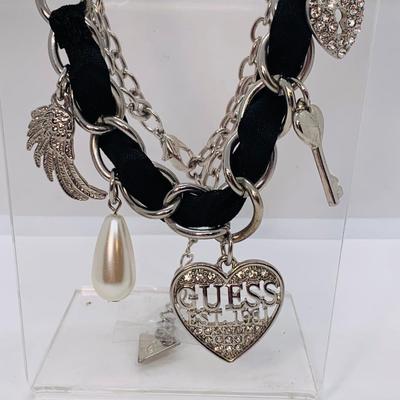 LOT 13: Guess Necklace, Angel Wing Earrings and Silver Tone Oval Link Braclet