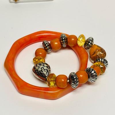 LOT 16: Beaded Oranges/Browns Necklace, Gold Tone Hoops, Dangle Earrings & Bangle Bracelet