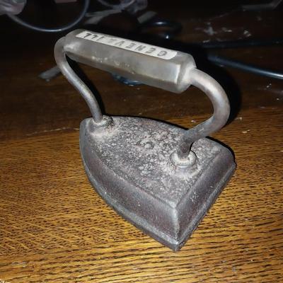 VINTAGE CASTIRON CLOTHES IRON- CANDELBRELLA-SINGLE CANDLE HOLDER