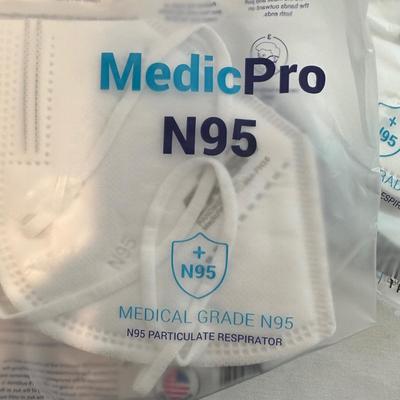 Assortment of Face Masks incl. Two Respirators, & Portable UV Sterilizer  (M-KL)