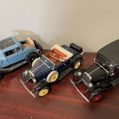 3 1/18th scale model cars
