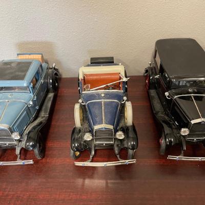 3 1/18th scale model cars