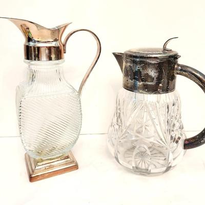Lot #101  Lot of 2 Pressed Glass Silverplate Water Pitchers