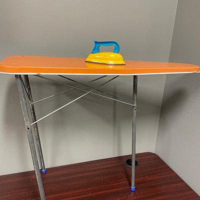 Vintage toy iron and ironing board
