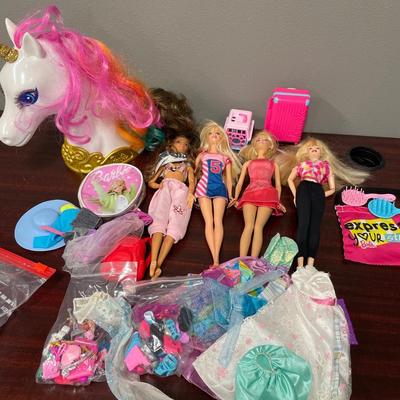 Barbie dolls, clothes, accessories and unicorn
