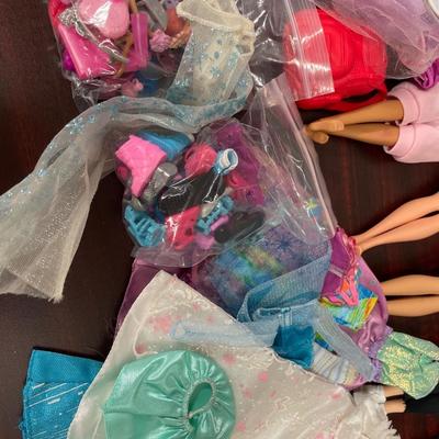 Barbie dolls, clothes, accessories and unicorn
