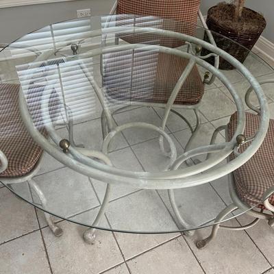 GLASS TOPPED TABLE AND 4 CHAIRS