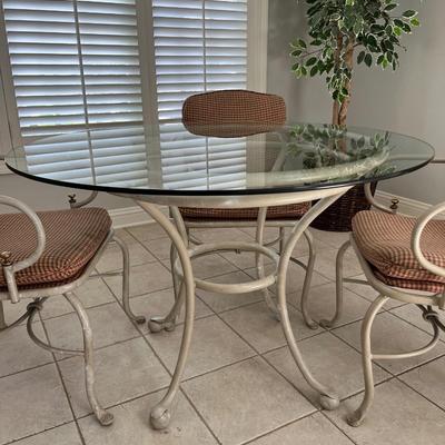 GLASS TOPPED TABLE AND 4 CHAIRS