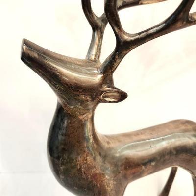 Lot #148  Heavy Silverplated Reindeer Candle Holder