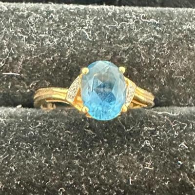 14 Karat Yellow Gold w/Blue Topaz Center and Diamond Millies