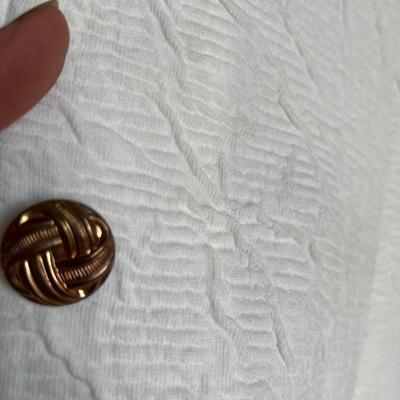 White pant suits