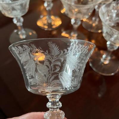 Set of 1920s, 1930s Tiffin crystal stemware â€œFuchsiaâ€
10 coupes, champagne glasses, sherbet glasses
9 small wine glasses, dessert...