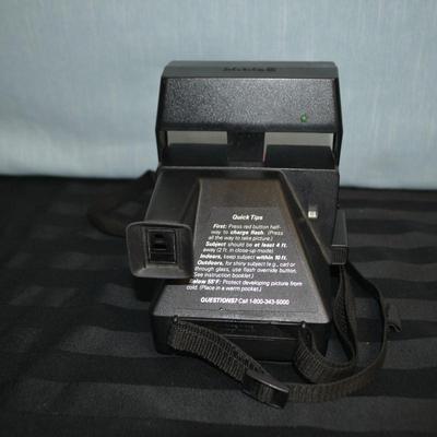 LOT 24.  VINTAGE POLAROID STATE FARM INSURANCE CAMERA