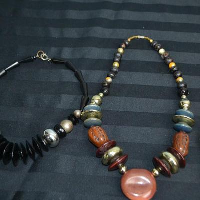 LOT 34. THREE NECKLACES