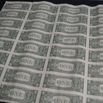 LOT 45. UNCUT SHEET OF  32 US ONE DOLLAR BILLS
