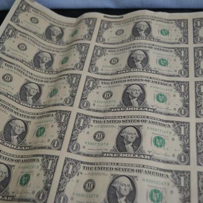 LOT 45. UNCUT SHEET OF  32 US ONE DOLLAR BILLS