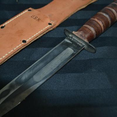 LOT 50. VINTAGE USN CAMILLUS COMBAT KNIFE AND SCABBARD