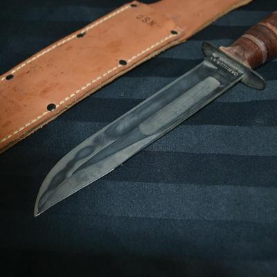 LOT 50. VINTAGE USN CAMILLUS COMBAT KNIFE AND SCABBARD