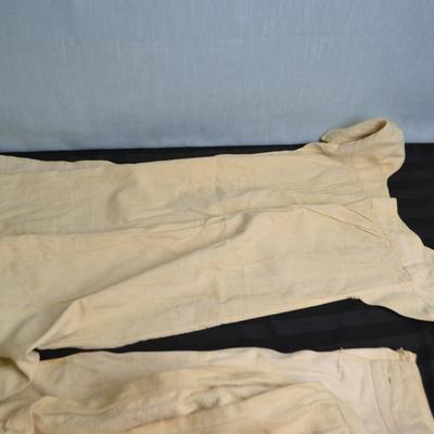 LOT 53. TWO ANTIQUE PANTS AND ONE DRESS