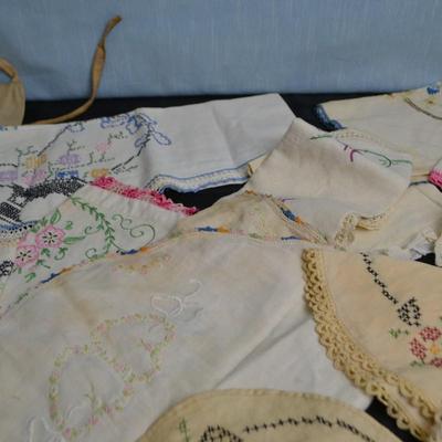 LOT 55. LUMBER YARD APRON AND EMBROIDERED VINTAGE LINENS