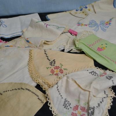 LOT 55. LUMBER YARD APRON AND EMBROIDERED VINTAGE LINENS