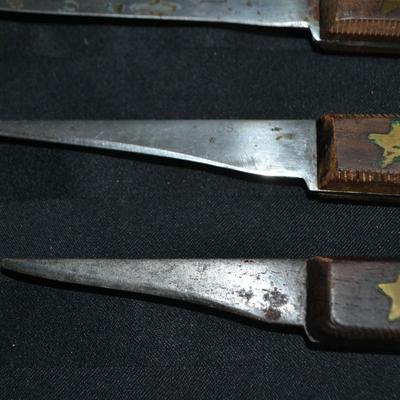 LOT 57. THREE VINTAGE FOSTER BROS KNIVES WITH STAR EMBOSSED WOOD HANDLES