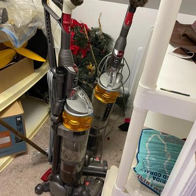 Two Used Dyson Vacuum Cleaners