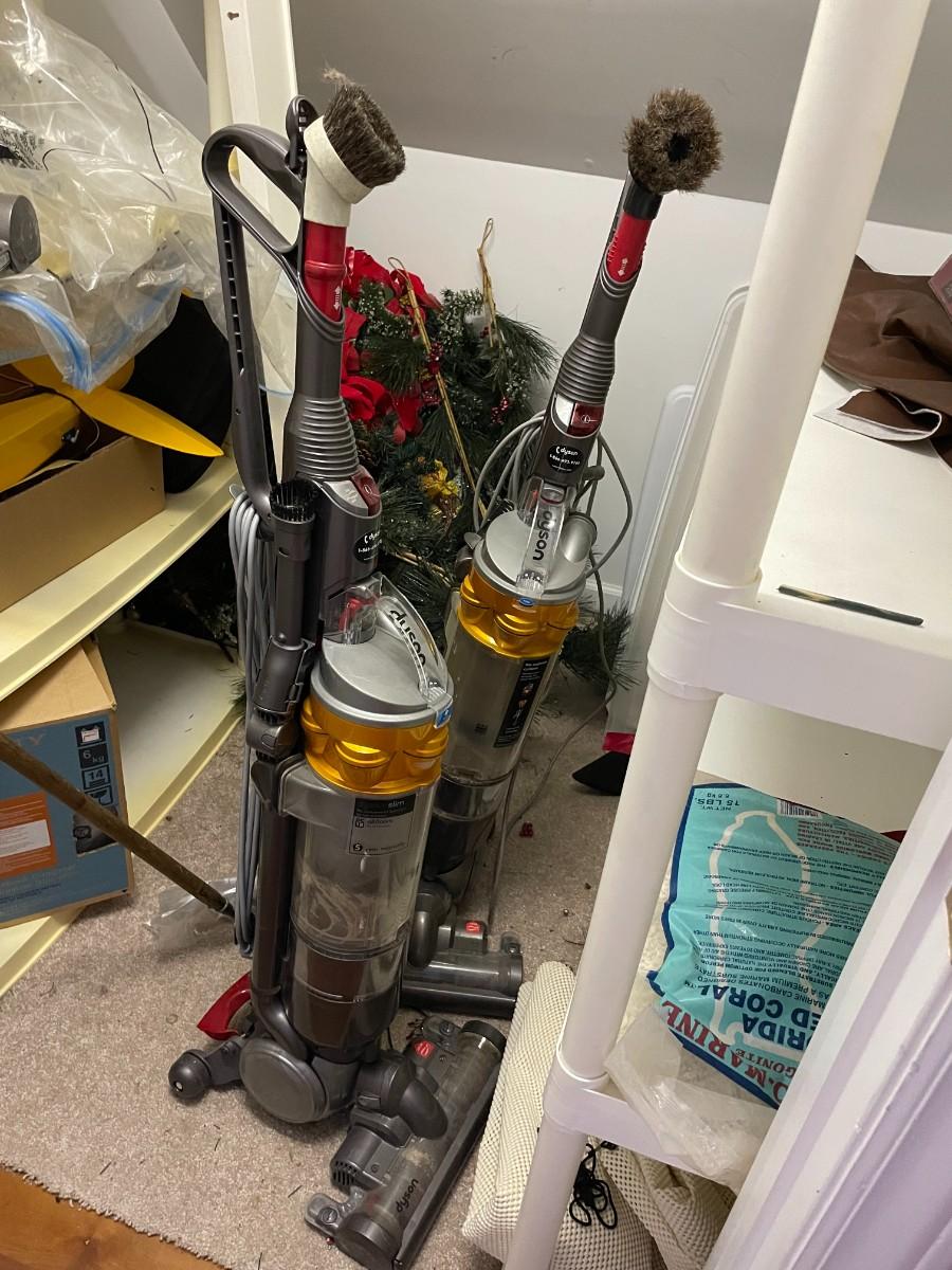 Two Used Dyson Vacuum Cleaners